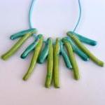 Statement necklace in shade..
