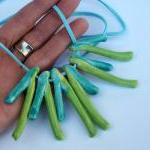 Statement necklace in shade..