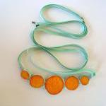 Statement necklace in shade..