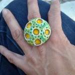 Green and yellow ring, cera..