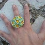 Green and yellow ring, cera..