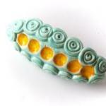 Aqua and yellow barrette, c..