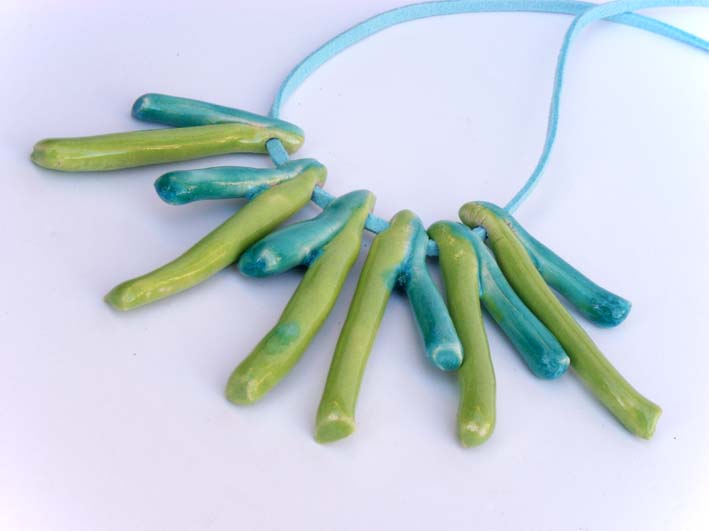 Statement necklace in shades of green and turquoise Spring trends 2012